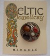 Vintage Miracle circular brooch Celtic Cabachon 