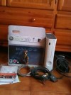 xbox 360+caja manuales y cables, tiene 3 luces rojas  