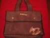 BOLSO CON MARCA BILLABONG  MARRON Y BORREGO PARA REYES 