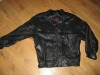 CHAQUETA  DE PIEL NEGRA CON FRANJA DE ANTE  