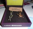 Boxed Lucky Brand key fobs heart and bow and arrow 