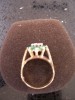 9CT GOLD EMERALD AND DIAMOND RING. 